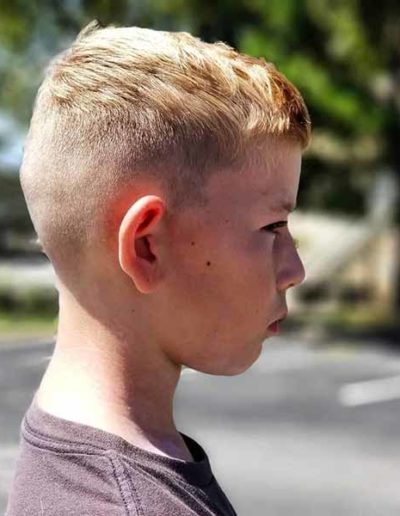 Kid's haircuts by New Dimensions School of Hair Design